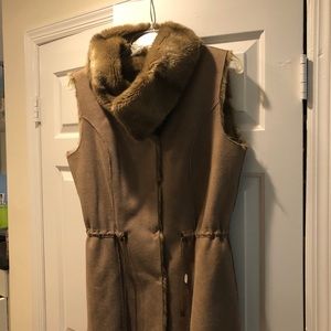 Vest small. Faux fur and suede I think.Bought at sample sale.EXCELLENTcondition